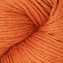 A close-up of a skein of yarn in a warm burnt orange color, filling the entire frame.