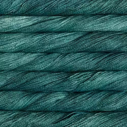 A close-up texture shot of teal blue-green yarn wound horizontally, showing the twisted strands and subtle sheen.