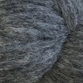 A close-up of fuzzy gray and black yarn texture.