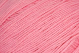 A close-up of pink yarn strands wound together, filling the entire frame.