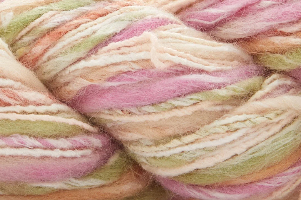 Close-up of a skein of pink and green yarn