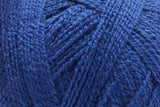 A close-up of a vibrant royal blue yarn ball, showing the soft, textured strands of the wool-like fiber.