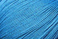 Close-up of blue yarn with a textured surface