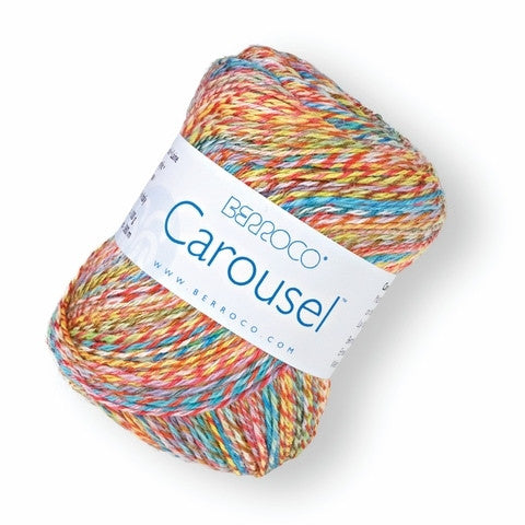 A skein of Berroco Carousel yarn with a white paper label, featuring a variegated multicolor yarn blend of orange, yellow, blue, and red on a white background.