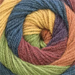 Colorful yarn ball with a gradient of blue, green, and brown.