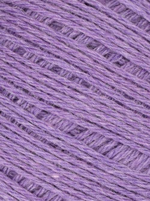 A close-up of lavender purple yarn wound in a textured herringbone pattern.