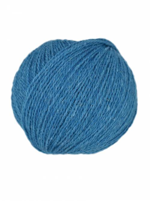 A ball of medium blue yarn photographed on a plain white background.