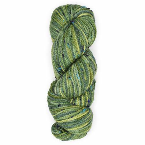 Green skein of yarn on a white background