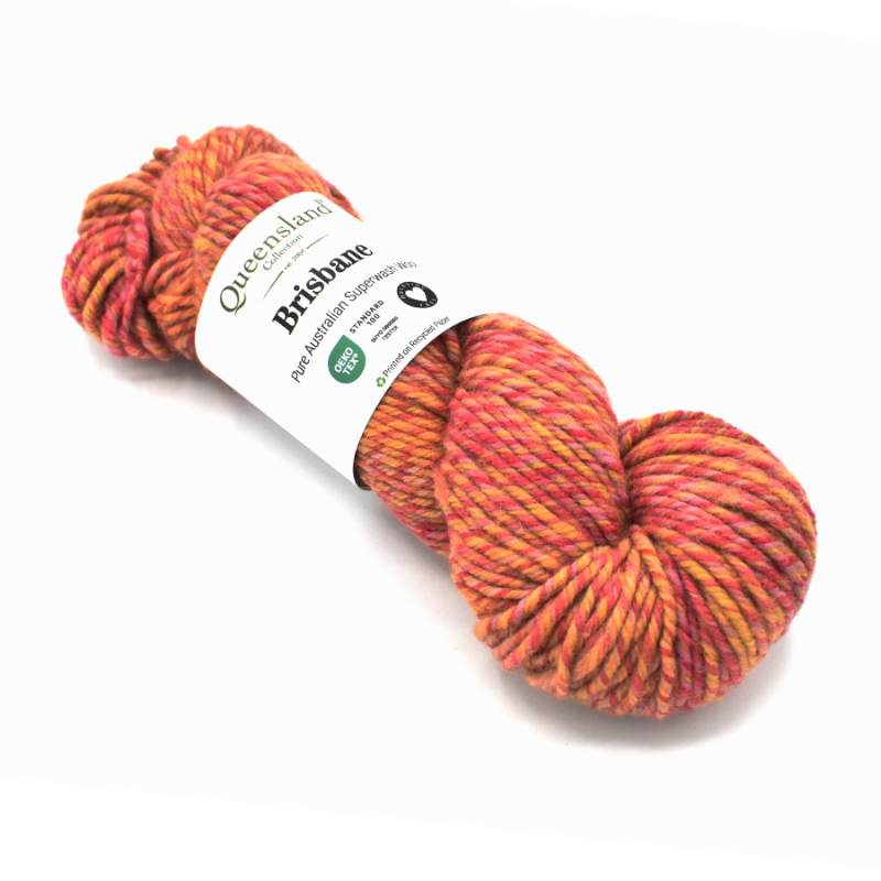 Multicolored skein of yarn with a label on a white background