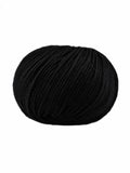 Black yarn ball on a white background