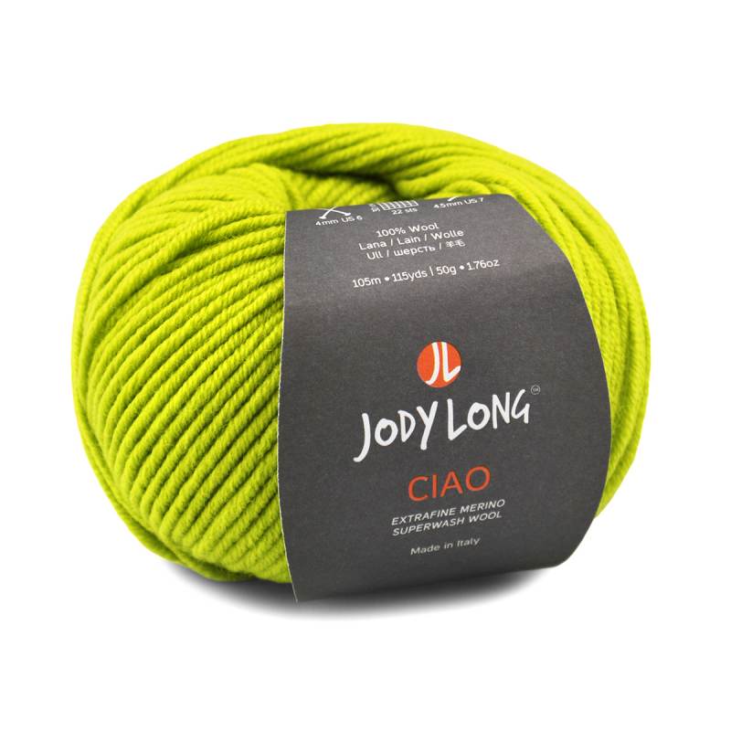 A ball of Jody Long Ciao extrafine merino superwash wool yarn in lime green, wrapped with a black paper label showing the brand name and product details.