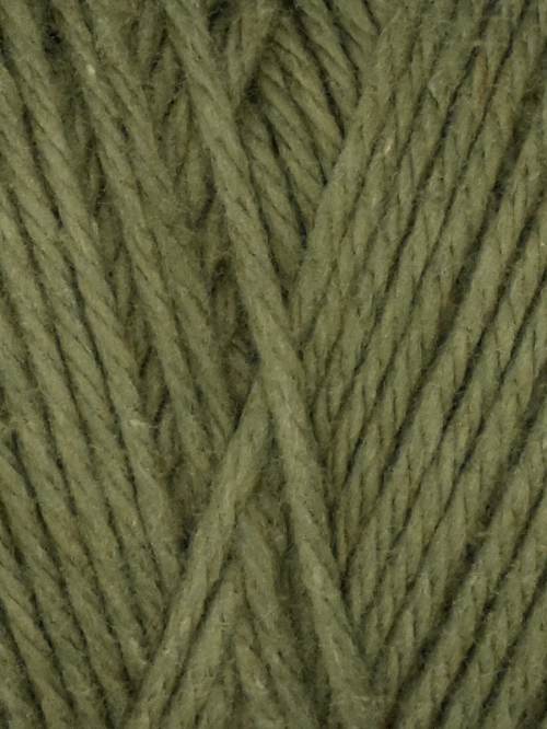 Close-up of green yarn with a textured pattern