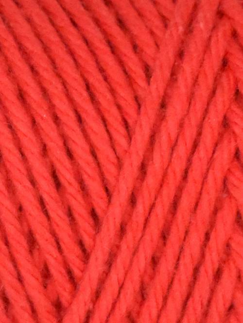 Close-up of bright red yarn with a textured pattern
