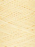 Close-up of a ball of light yellow yarn