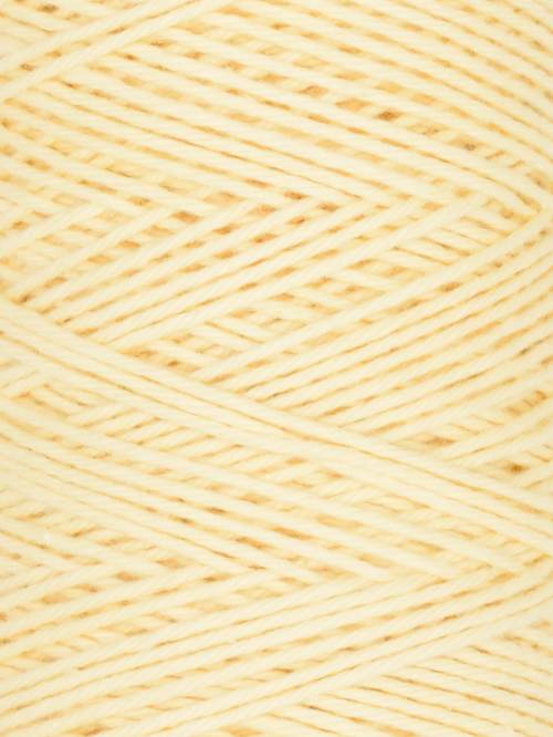 Close-up of a ball of light yellow yarn