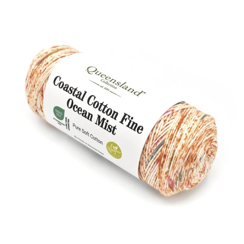 Roll of Queensland Coastal Cotton Fine Ocean Mist yarn on a white background