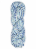 A single skein of variegated yarn in shades of light blue, medium blue, and white, photographed against a plain white background.