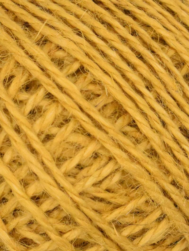 A close-up texture shot of twisted yellow yarn strands filling the frame.