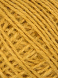 A close-up texture shot of twisted yellow yarn strands filling the frame.