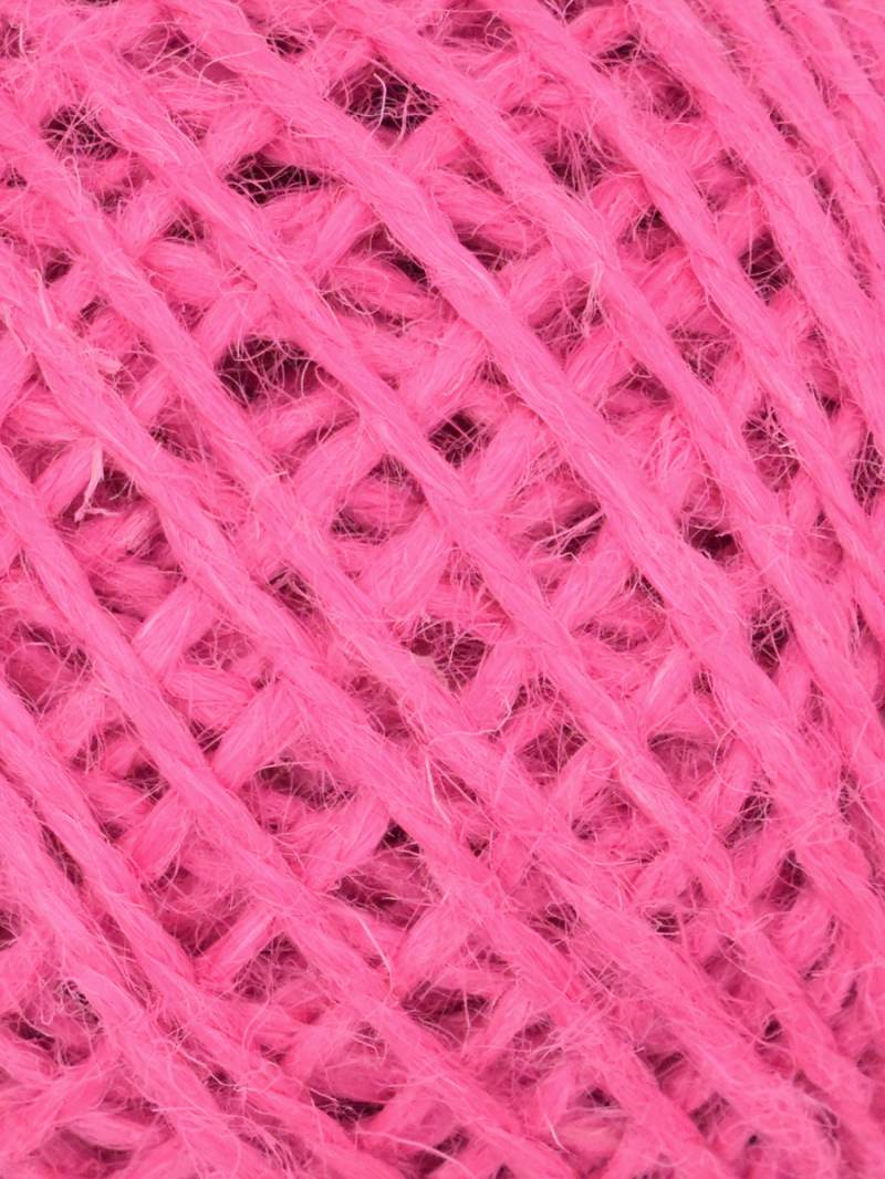 A close-up of bright pink yarn with a soft, fuzzy texture arranged in a crisscross pattern.
