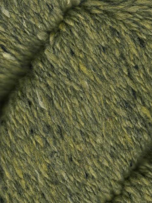 Close-up of a textured yarn skein in a heathered olive green color with subtle yellow and dark charcoal flecks.