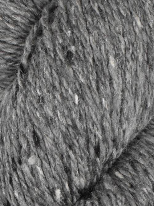 Close-up of a heather gray wool yarn skein showing the textured twisted fibers and mixed gray tones.