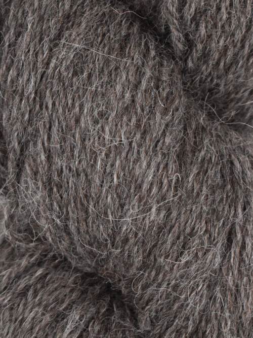 A close-up texture shot of a dark brown and gray heathered yarn, showing the fuzzy, twisted fibers in detail.