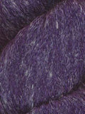 A close-up of a textured purple yarn with subtle white and violet flecks throughout.