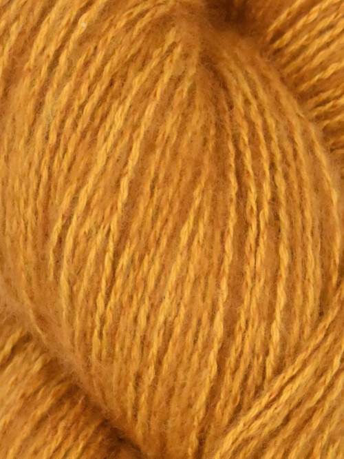Close-up of a ball of orange yarn