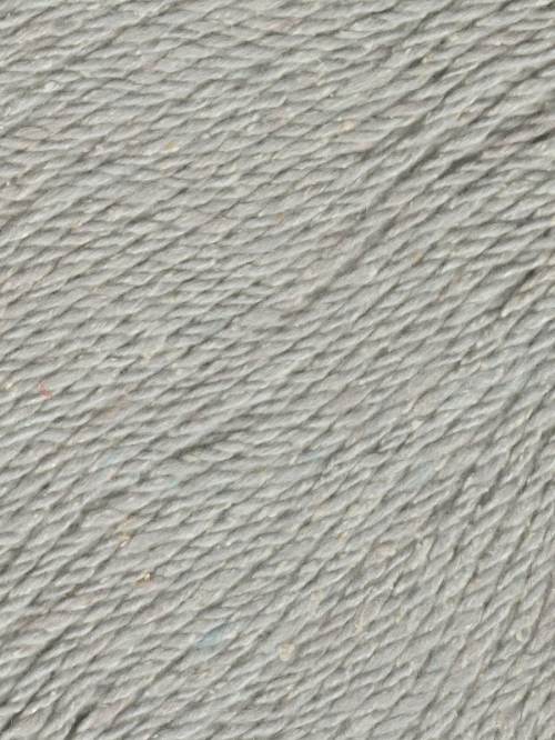 A close-up texture shot of a light gray, heathered fabric with a fine, ribbed pattern.