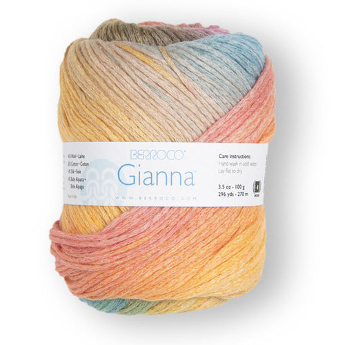 Multicolored skein of yarn with a label on a white background