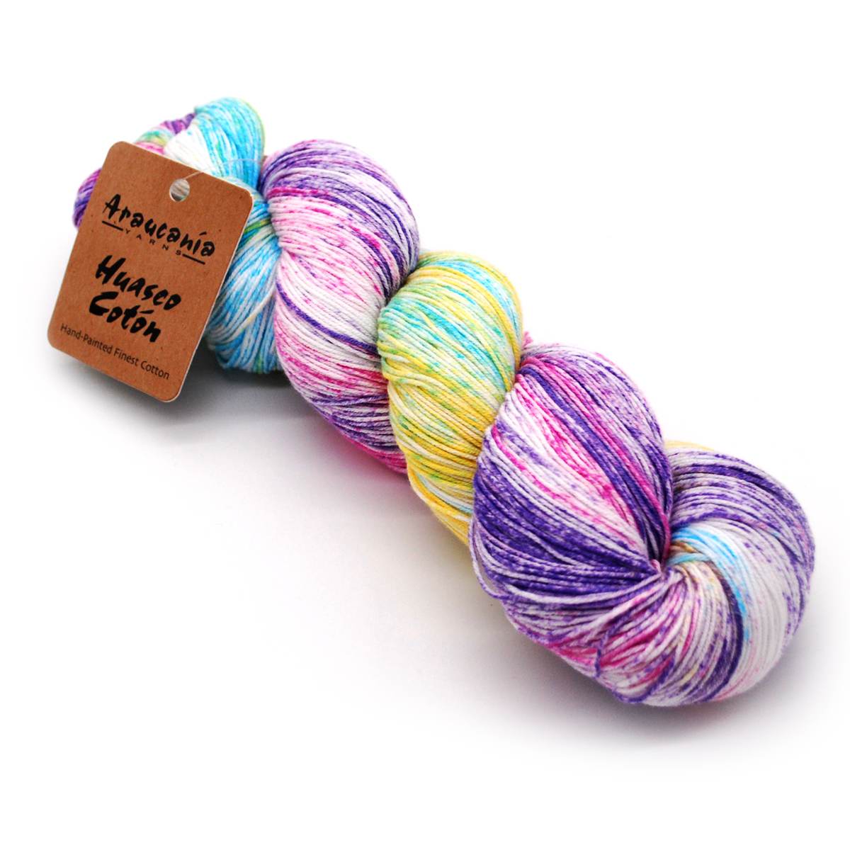 A single skein of variegated yarn with a brown paper label reading 'Arquénido Huasco Colón', shown on a clean white background. The yarn has marbled strands of purple, pink, blue, yellow, and white.