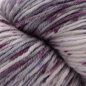 Close-up of purple and white yarn with a subtle pattern
