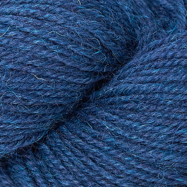 Close-up of blue yarn with a textured surface