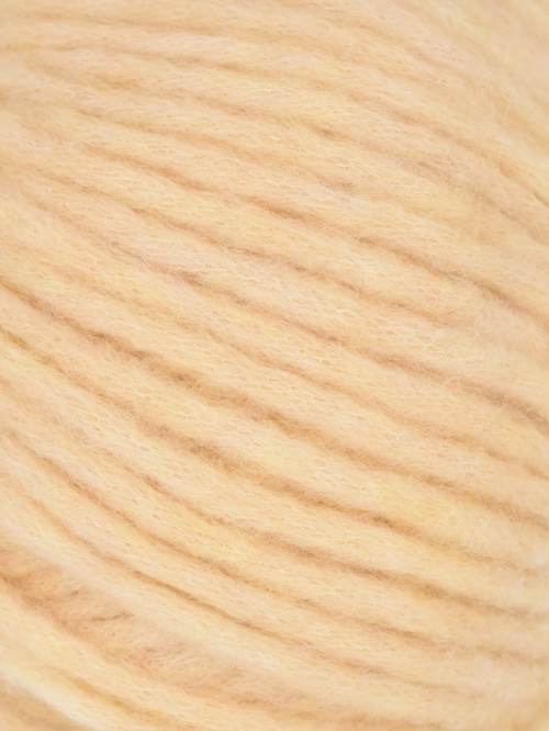 Close-up of beige yarn texture