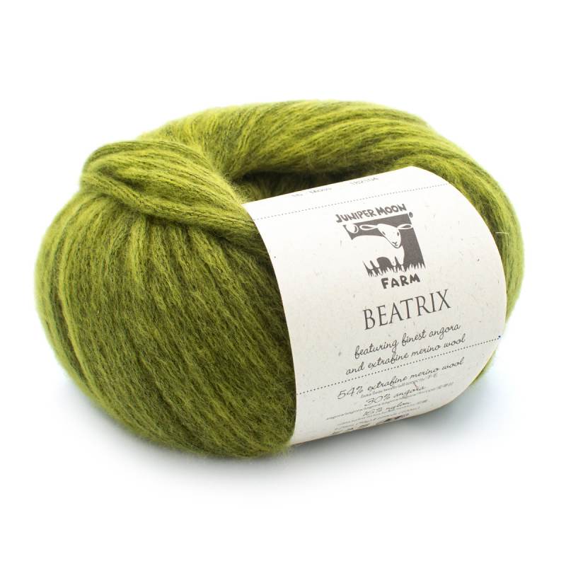 Green skein of yarn with a label on a white background