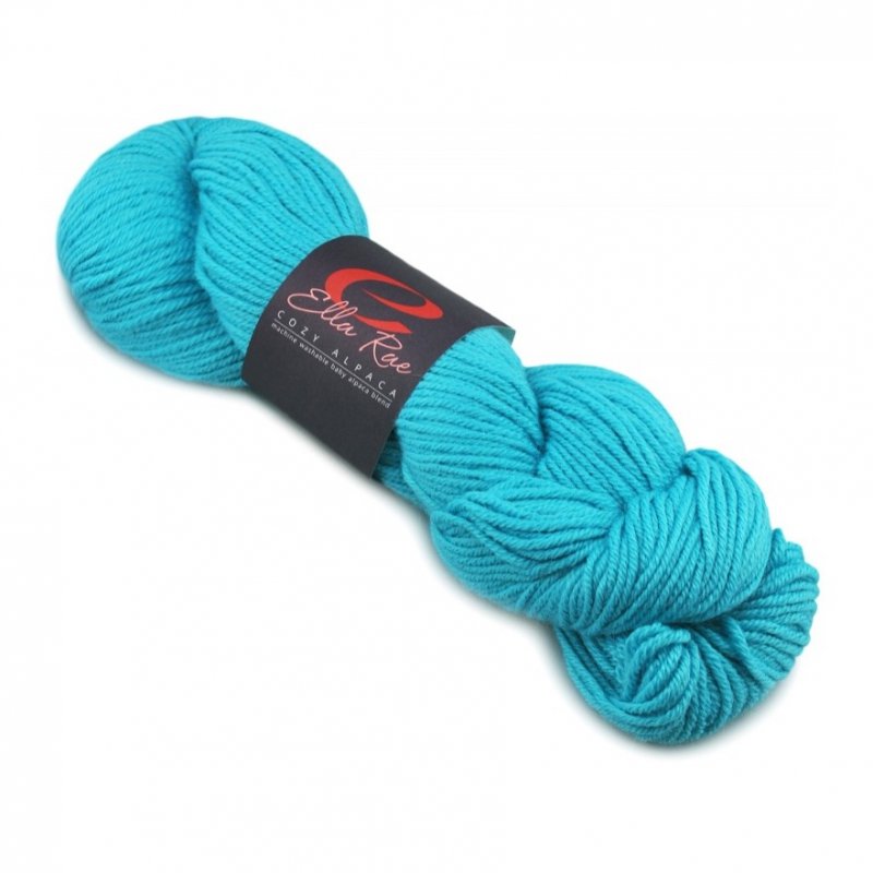 A skein of bright turquoise blue yarn with a black paper label wrapped around it, photographed on a clean white background. The label shows the brand name 'Silver Rose'.