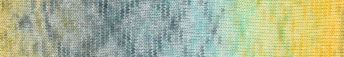 A close-up of a textured fabric or material swatch with a mottled gradient transitioning from gray and blue on the left, through teal in the center, to yellow on the right.