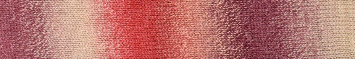A close-up of a textured knit fabric swatch featuring a vertical gradient pattern transitioning from dusty rose pink to coral red and light beige.