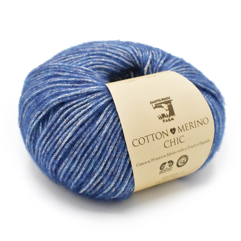 Blue yarn ball with a label on a white background