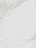 Close-up of textured white fabric