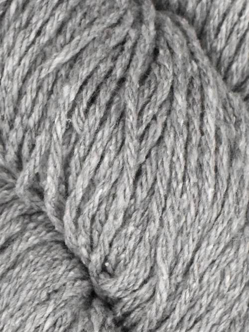 Close-up of gray yarn with a textured pattern
