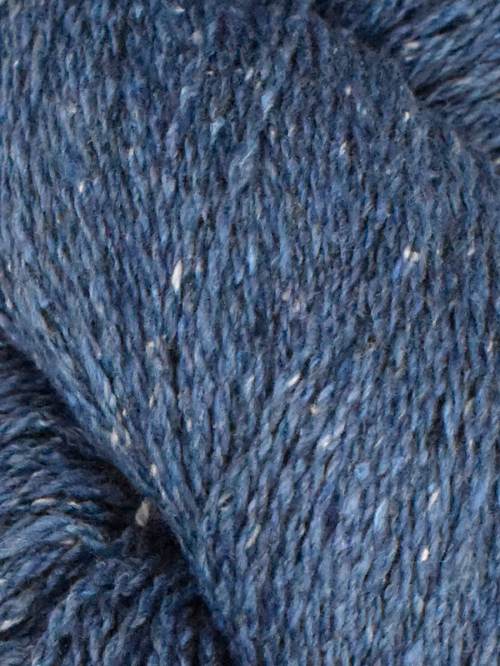 Close-up of blue yarn with a textured pattern