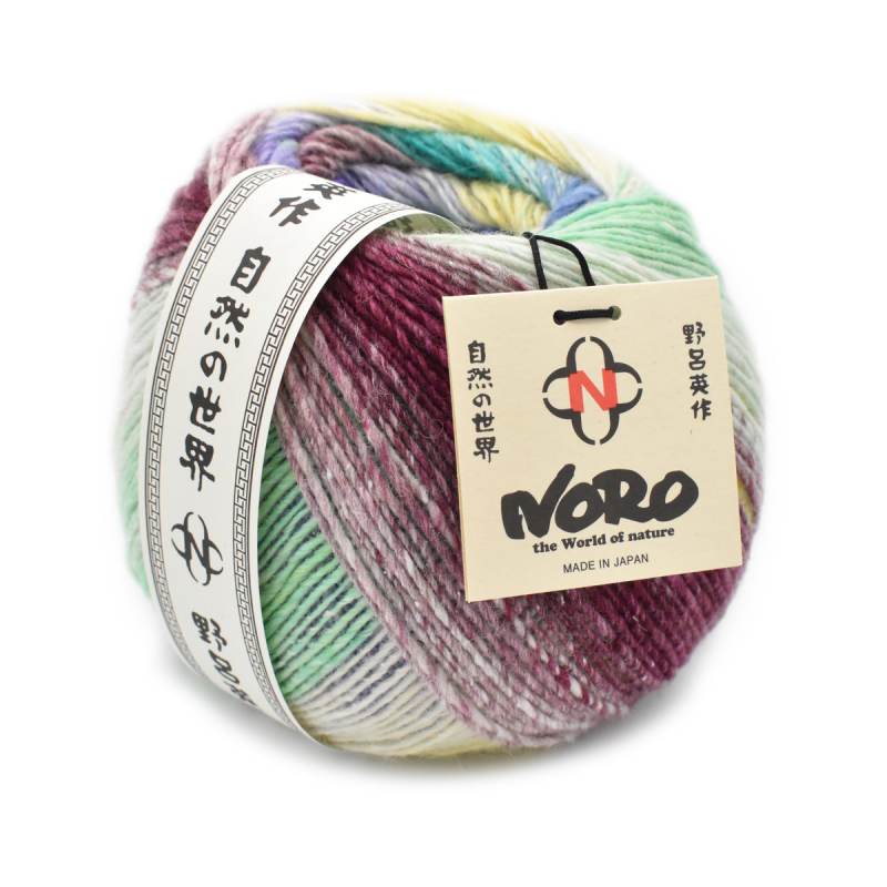 Multicolored yarn ball with a Noro label on a white background