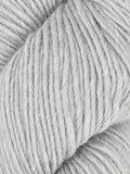 A close-up of light gray plied yarn, showing the texture and color of the twisted fibers.