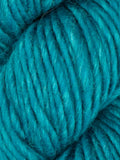 Close-up of teal yarn with a soft texture