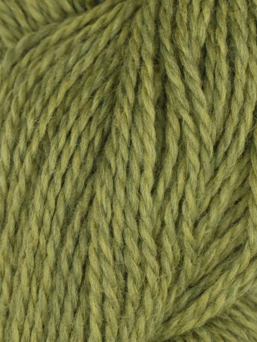 Close-up of green yarn with a textured pattern