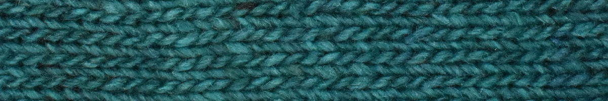 Close-up of teal fabric texture