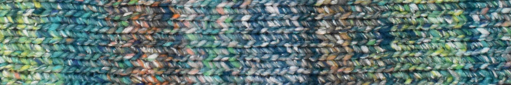 Close-up of a textured fabric with multicolor pattern