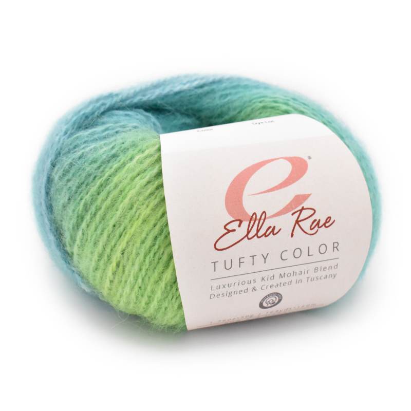 A skein of Ella Rae Tufty Color yarn showing a soft variegated blend of light green and teal blue, wrapped with a white paper label.